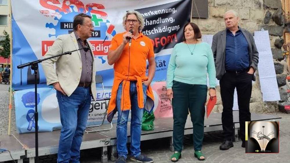 ΚΟΛΩΝΙΑ: Διαδήλωση για ΠΑΡΕΝΕΡΓΕΙΕΣ εμβολίων – Πολίτες ζητούν ΑΝΑΓΝΩΡΙΣΗ και ΑΠΟΖΗΜΙΩΣΗ